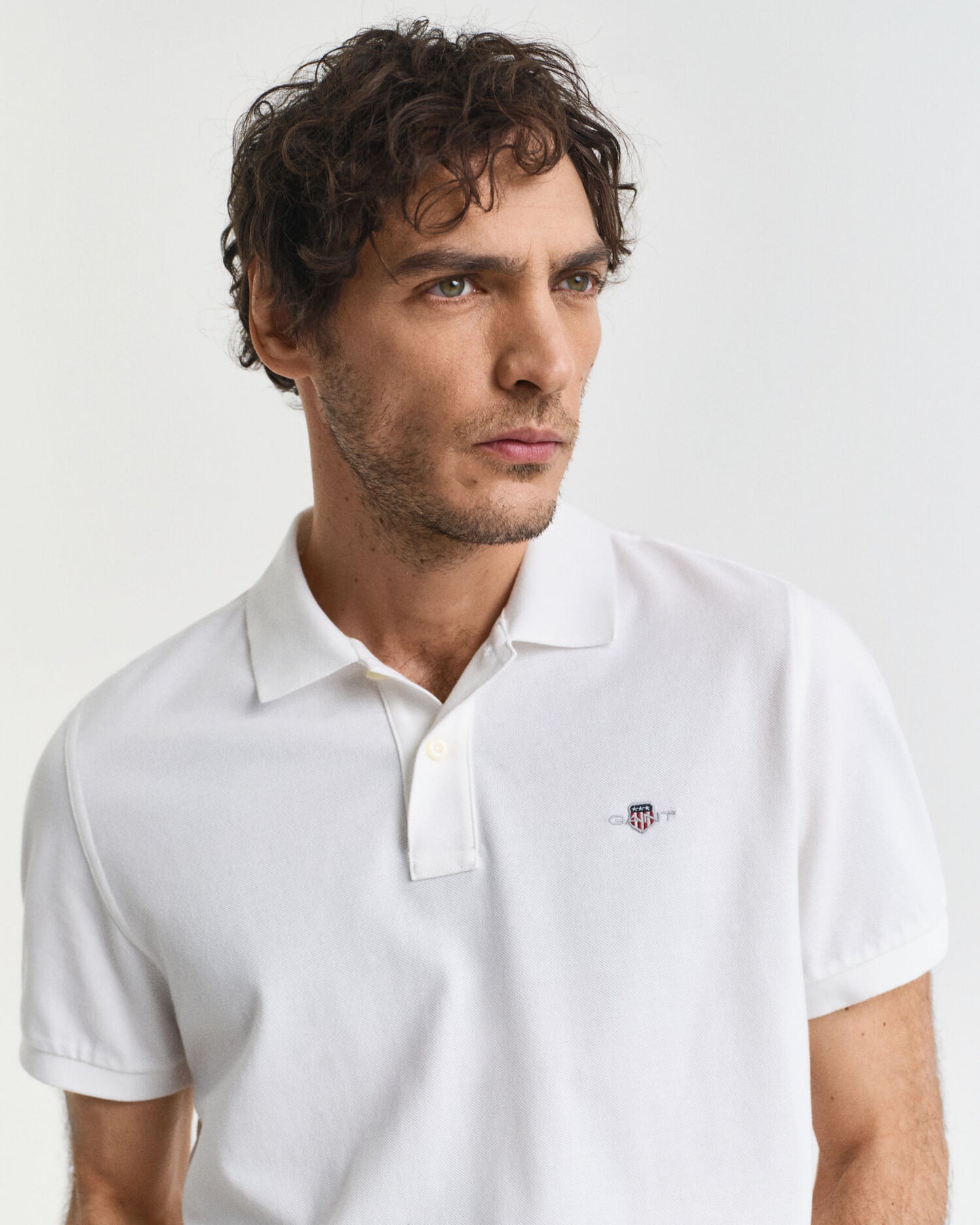 Poloshirt aus Piqué mit Wappen-Stickerei, Regular Fit